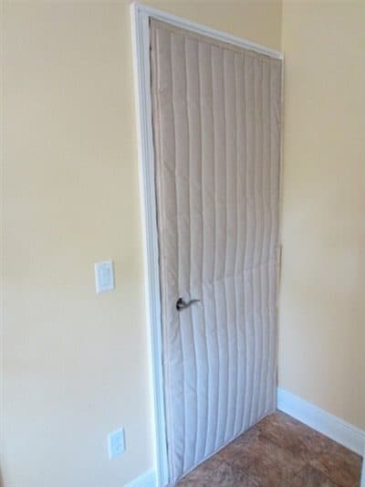 Use Soundproofing Blankets on hollow door